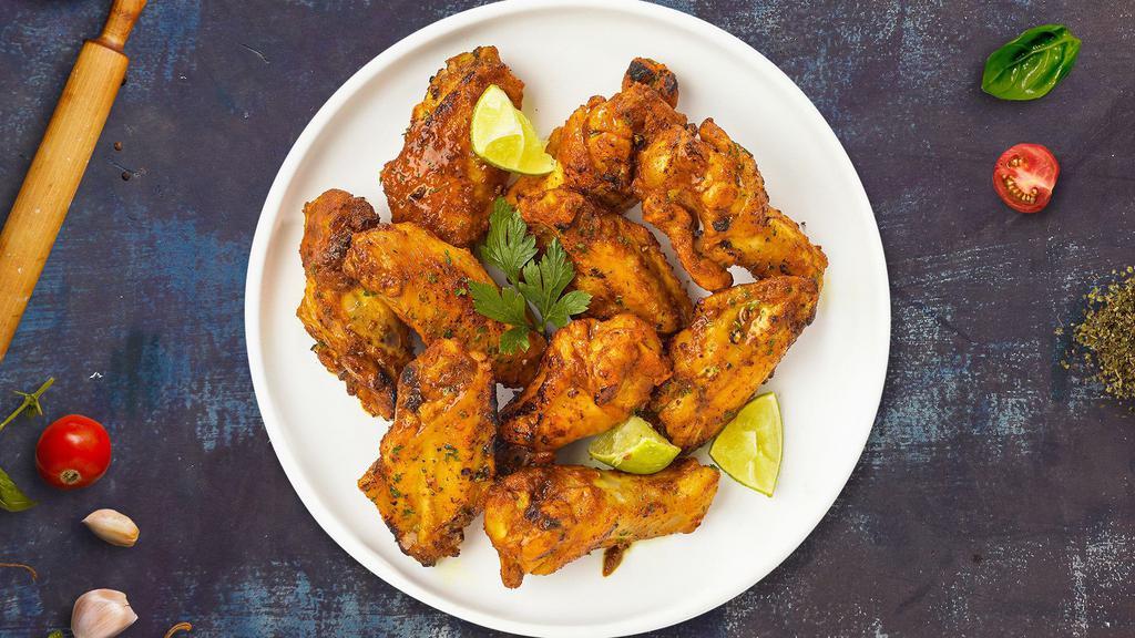 Lemon Slayer Pepper Wings · Fresh chicken wings breaded, fried until golden brown, and tossed in lemon pepper sauce. Served with a side of ranch or bleu cheese.