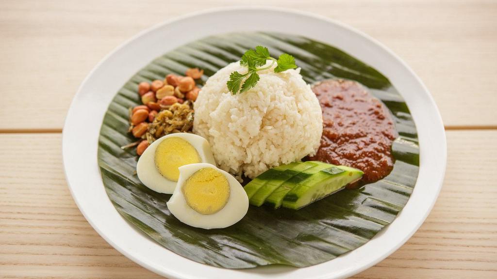 Plain Nasi Lemak · steamed rice cooked in coconut milk, served with sambal, fried anchovies, hard boiled egg, peanuts and cucumbers