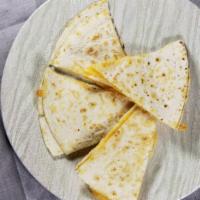 Spinach Quesadillas · A grilled flour tortilla filled with spinach, onions, mushrooms & Monterey Jack cheese. serv...