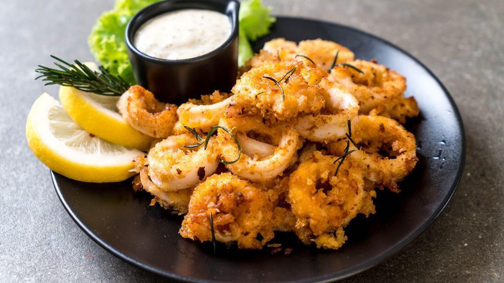 Fried Calamari · Crispy squid battered and fried to perfection.