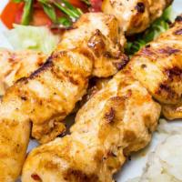 Chili Chicken Kabob Plate · Fresh chicken kabob marinated in chili served with steamed rice, salad, hummus and side of p...