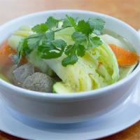 Caldo de Res · Beef soup with veggies and a side of rice.