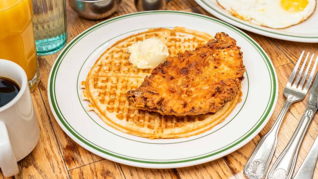 Buttermilk Fried Chicken Waffle · Buttermilk Fried chicken breast, Waffle, two eggs (any style); served with syrup on the side