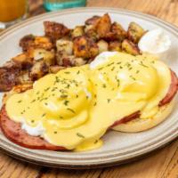 Egg Benedict · Two medium poached eggs, ham, English muffin, and hollandaise sauce. Consuming undercooked e...