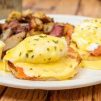 Eggs Lox · Two medium poached eggs, lox, English muffin, and hollandaise sauce.