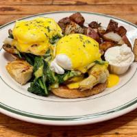 Eggs Florentine · Vegetarian dish. Two medium poached eggs, spinach, mushrooms, artichoke, English muffin, and...