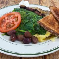 Greek · Vegetarian dish. Feta cheese omelette wrapped in sautéed spinach, olives, and tomatoes