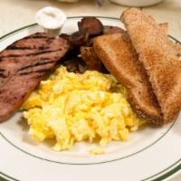Classic Two Eggs Any Style · Classic 2 eggs any style, choice of toast, & grilled potatoes