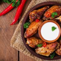 Extra Hot Wings · Wings, marinated in our house seasonings and grilled to a perfect crisp with a glaze of our ...