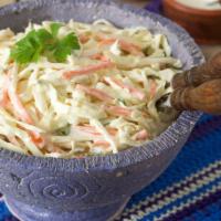 Coleslaw · Vegetarian. Sweet and tangy, crunchy and creamy, housemade coleslaw.