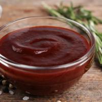 BBQ Sauce · Our housemade sweet and smoky BBQ sauce.