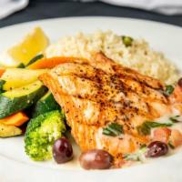 Salmone Siciliana · Grilled fresh salmon with capers, olives, tomatoes, lemon shallot sauce served over rice and...