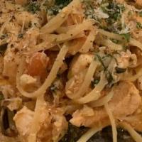 Saltimbocca di Vitello · Veal scaloppini layered with prosciutto, sage, mozzarella cheese, potatoes, vegetables, demi...
