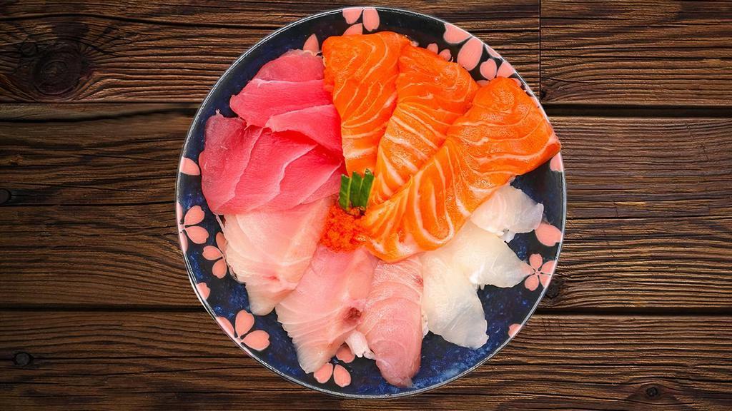 Chirashi Don (Mixed Sashimi Bowl) · Mix of different delicious varieties of sashimi over rice or salad (fish may vary based on seasonality)