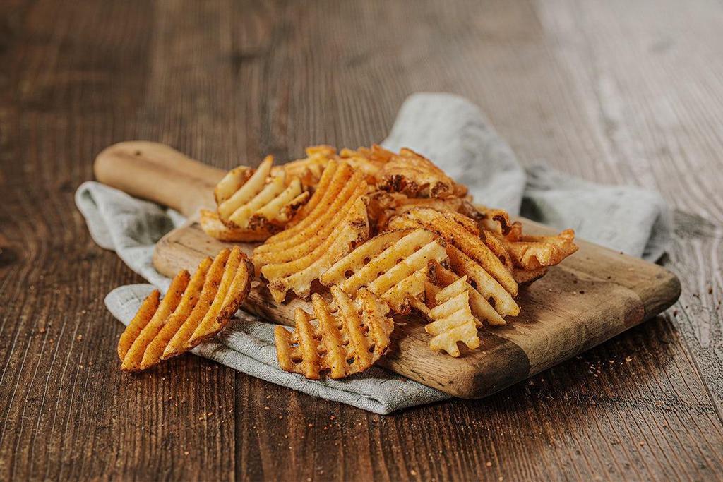 Waffle Fries · Crispy with gold standard BBQ seasoning.