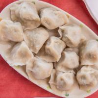 高丽菜猪肉Pork Dumplings with Cabbage · Twelve pieces.