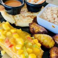 Sweet Corn Tamale · A homemade sweet corn tamale covered with mango salsa. Served with a 1/2 portion of fried pl...