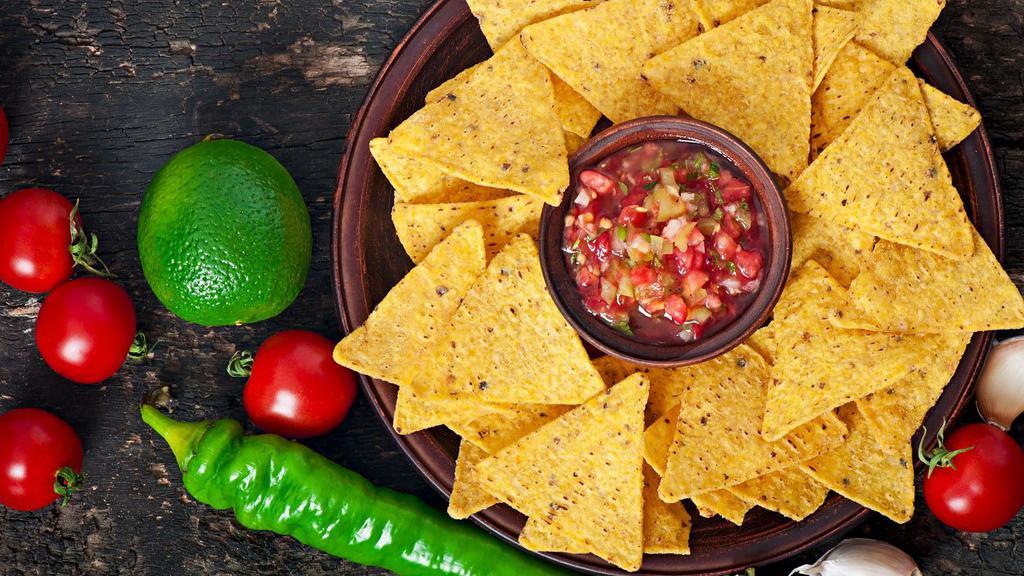Famosa Salsa Pico and Housemade Corn Chips · Hand Crafted Pico salsa served with delicious corn chips.