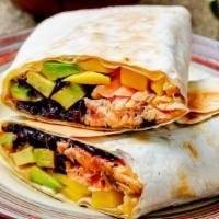 Fish Burrito · Fresh caught white fish, pico de gallo, cabbage, Spanish rice, beans, and cream wrapped in a...