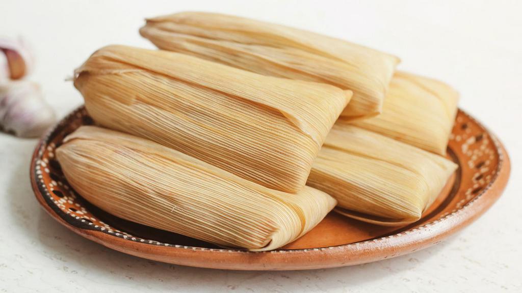 Tamale · Homemade Tamale served in customer's preference of flavor.