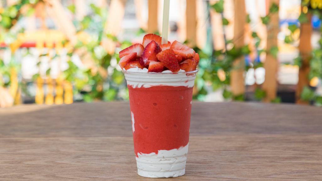 Monki Strawberry 20 Oz · Shaved ice, strawberry concentrate and topped with whipped cream and fresh strawberries.