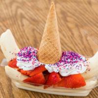 Banana Unicorn · Banana with a delicious three milk cream, topped with whipped cream, strawberries, Hershey's...
