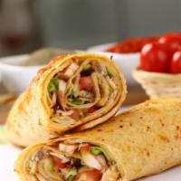 Grilled Kofte Wrap · On Lavash bread. Includes grilled beef kofte, lettuce, carrots, tomatoes, and pickles, with ...