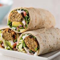 Falafel Wrap · On Lavash bread. Includes falafel, lettuce, carrots, tomatoes, and pickles, with yogurt sauce.