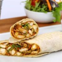 Combo Doner Wrap · On Lavash bread. Includes chicken, lamb & beef doner meat, lettuce, carrots, tomatoes, and p...