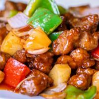 E12. Sweet & Sour Pork 菠蘿古嚕肉 · With pineapple and bell pepper.