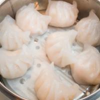 Crystal Shrimp Dumplings (Har Gow) · Steamed shrimp dumplings served with wasabi soy.