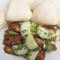 Soy Glazed Pork Belly Sliders · Finger sandwiches with cucumbers, green onions, sesame seeds & hoisin sauce.