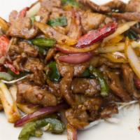 Mongolian Lamb · Spicy.  In a sweet spicy garlic bean paste.