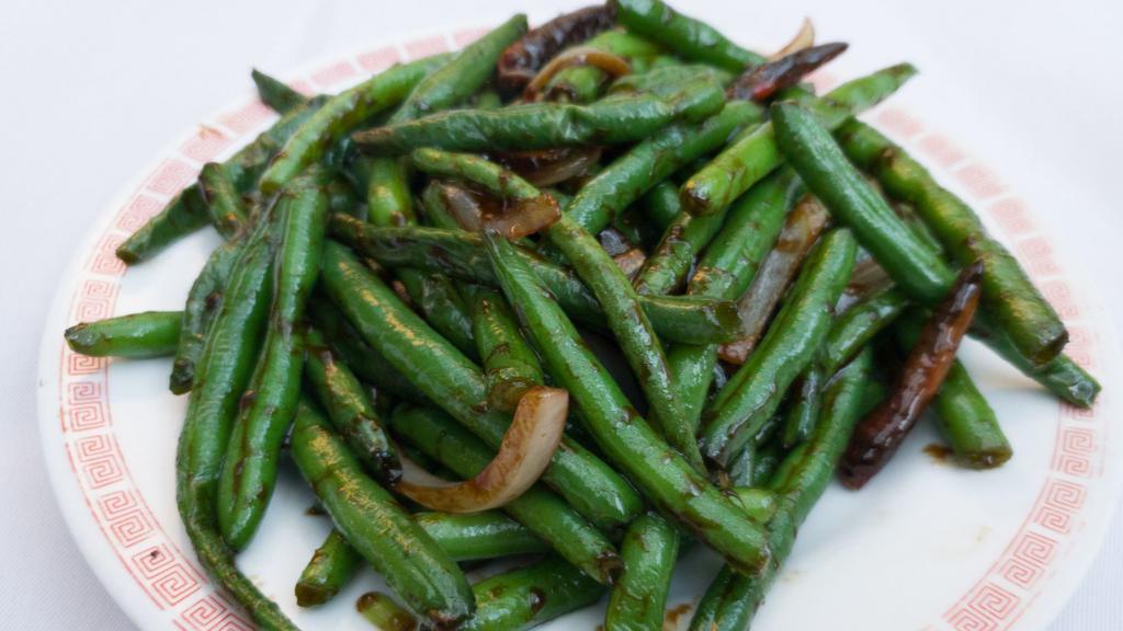 Dry Braised String Beans · Spicy.  Wok tossed in a sweet spicy garlic bean paste.