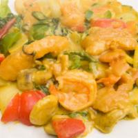 Coconut Curry · Spicy.  Spicy curry with fresh veggies & coconut milk.