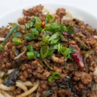 Szechwan Pork Noodles · Spicy.  Minced pork,  salted greens in a spicy sesame garlic paste topped with green onions,...