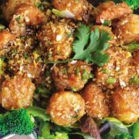 Garlic Shrimp & Scallops · Garlic sauteed with shrimp and scallops served with steam broccoli.