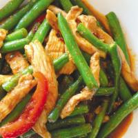 Pad Phrik Khing · Choice of meat stir-fried with green beans, bell peppers, kaffir lime leaves in a Thai chili...