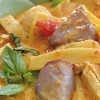 Red Curry · Eggplant, bamboo shoots, bell peppers and basil leaves in Thai red coconut milk curry. Mediu...