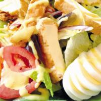 Thai Salad · A salad of lettuce, cucumbers, tomatoes, onions topped with homemade honey mustard dressing.