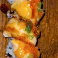 68. Lion King Roll · (crab meat, avocado topped with  baked salmon & tobiko).