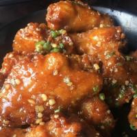 76. Japanese Chicken Wings · (deep fried chicken wings sauteed with  garlic, green onion in our special homemade sweet & ...
