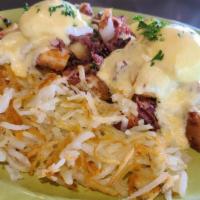 Corned Beef Hash · Toasted muffin, corned beef hash, poached eggs and hollandaise.