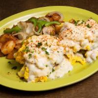Southern · Two biscuits topped with country sausage, scrambled eggs and our country gravy (no toast).