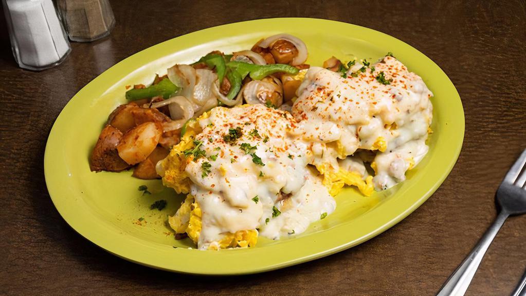 Southern · Two biscuits topped with country sausage, scrambled eggs and our country gravy (no toast).