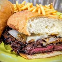 Steak · Grilled skirt steak, Jack cheese and grilled onions served on a French roll.