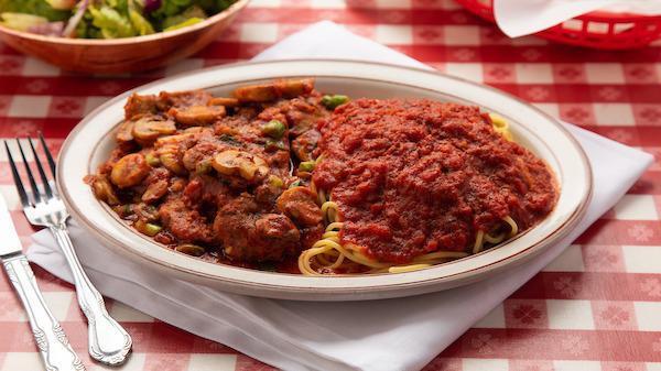 Veal Scaloppini · Cooked with mushrooms, onions in a red tomato and wine sauce.