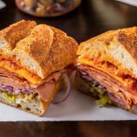 The Whatchamacallit · beef bologna, calabrese salame, cheddar, oil vinegar, hot garlic spread, onions, pepperoncic...