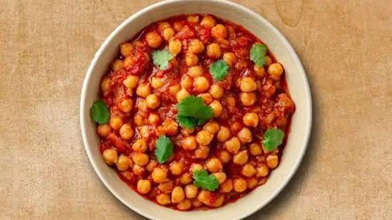 Charismatic Chickpea · Chickpea cooked with different spices and herbs and veggies.
