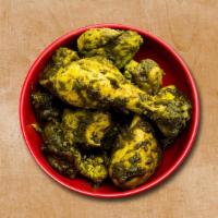 Spinach Valley Chicken · Tender chicken cooked with spinach and Indian spices Served with the basmati rice
